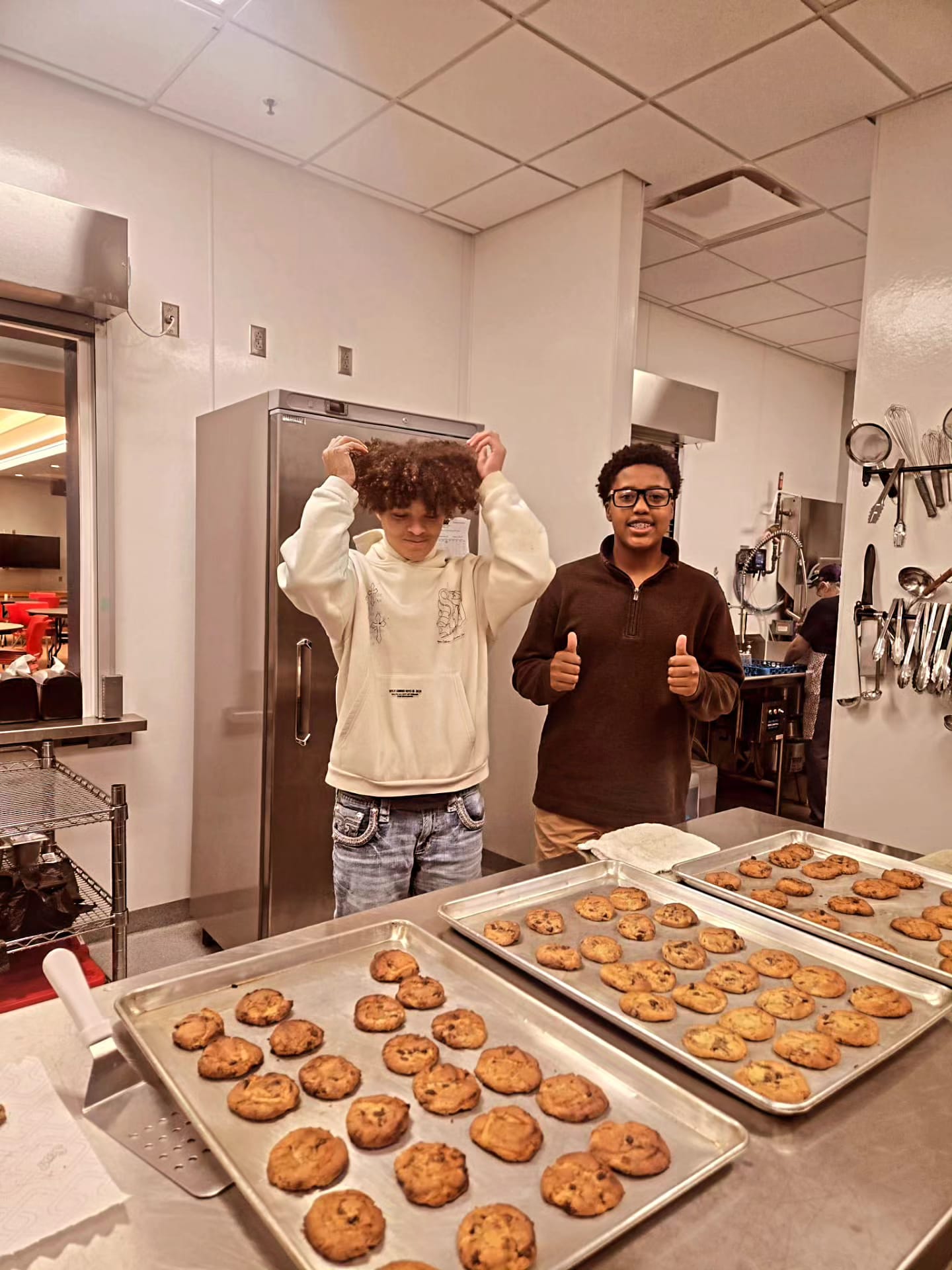 Ross baking cookies for charity