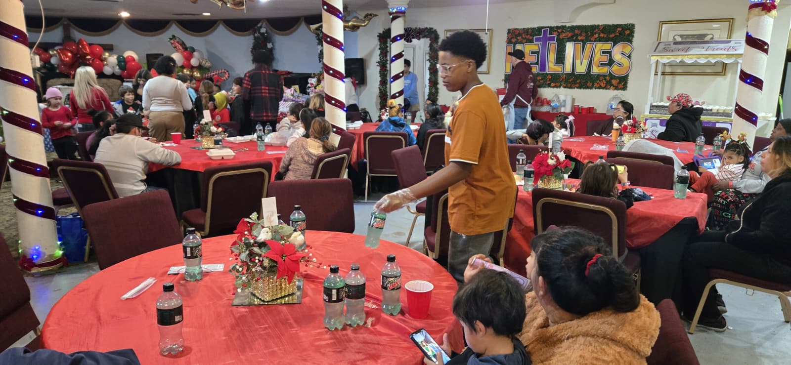 Ross serving at a community dinner