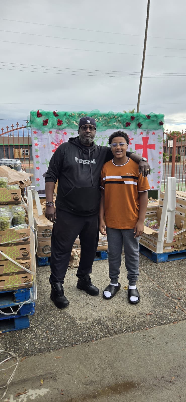 Ross volunteering with his father